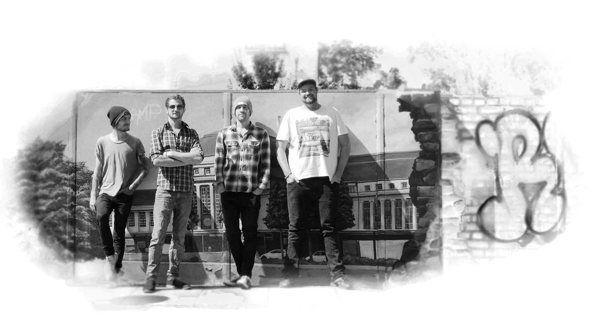 British indie-pop/indie-rock band, OJ On The Run, standing in front of graffiti in Leipzig